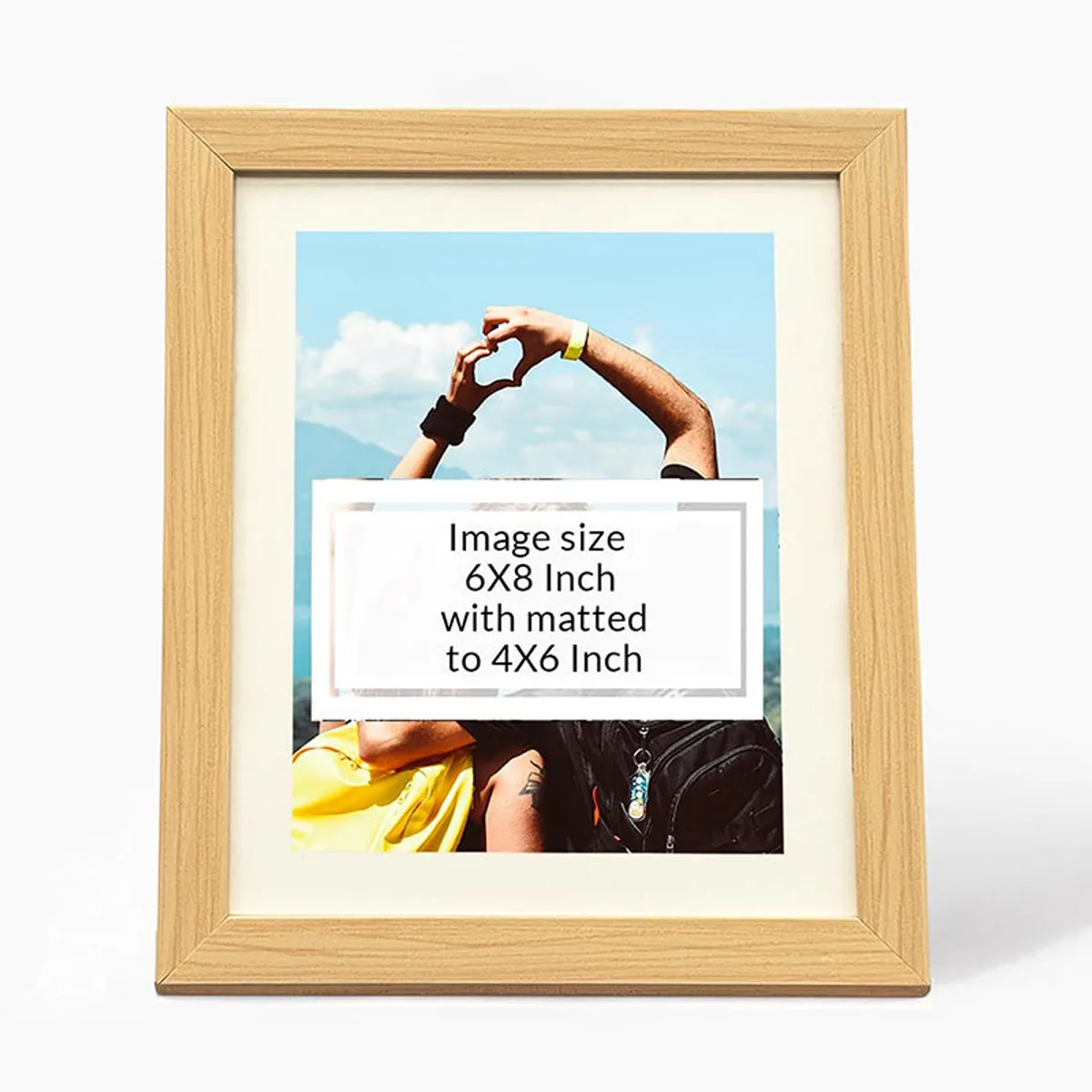 Hands peeling protective film from a clear frame front