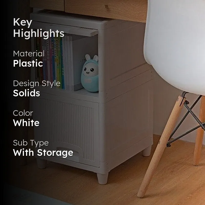 White organizer with ribbed front panels beside a desk