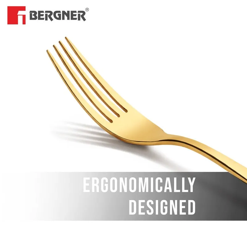 Close-up of a gold fork showing its smooth curved handle