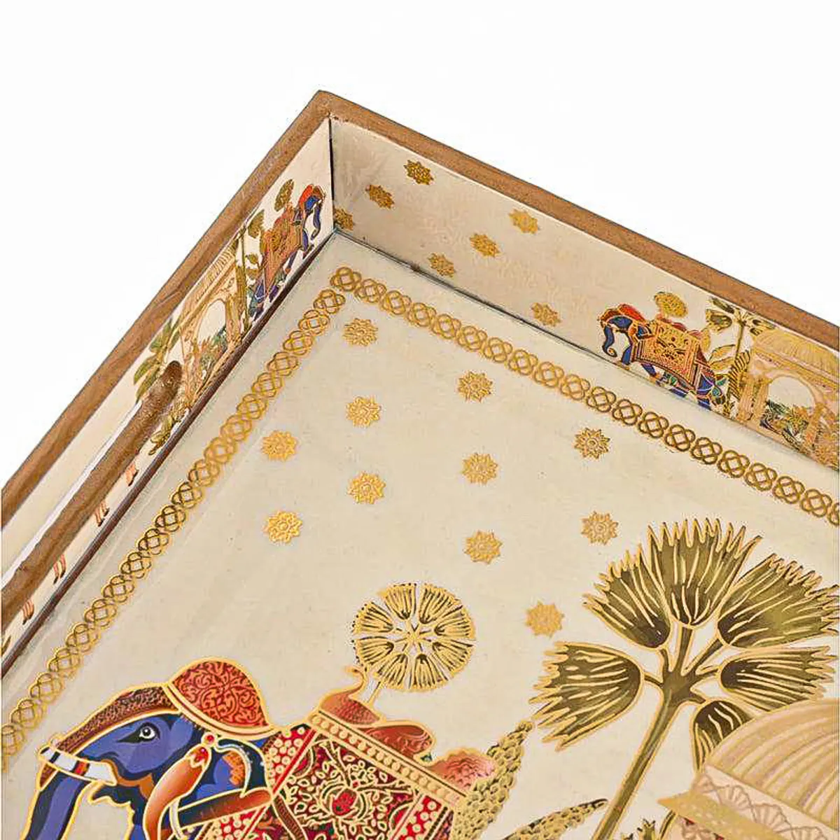 Close-up of tray artwork showing a decorated elephant, foliage and ornate border
