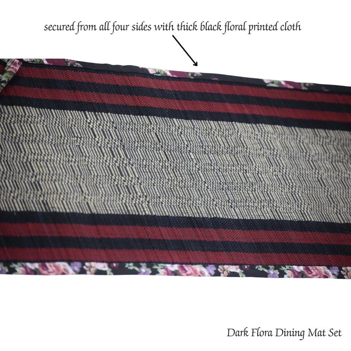 Close-up of the runner’s maroon, black and floral border