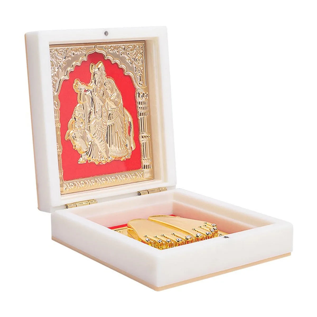 Angled view of an open ivory Radha Krishna accent box with a red and gold interior