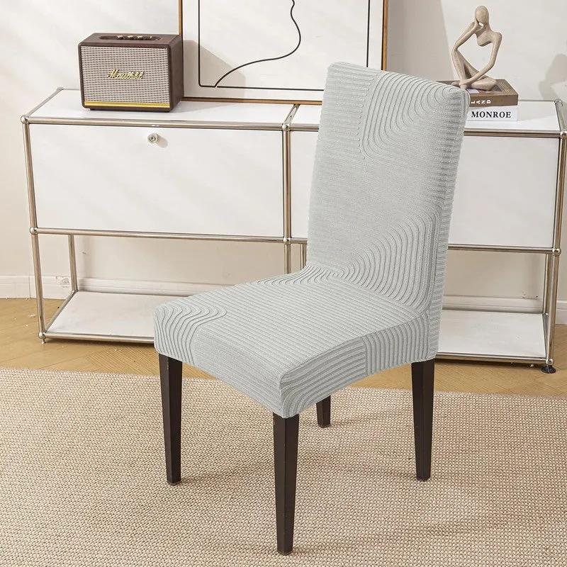 Single dining chair with a grey textured fitted chair cover
