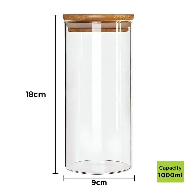Single transparent cylindrical storage jar with a natural-toned lid on a white background.