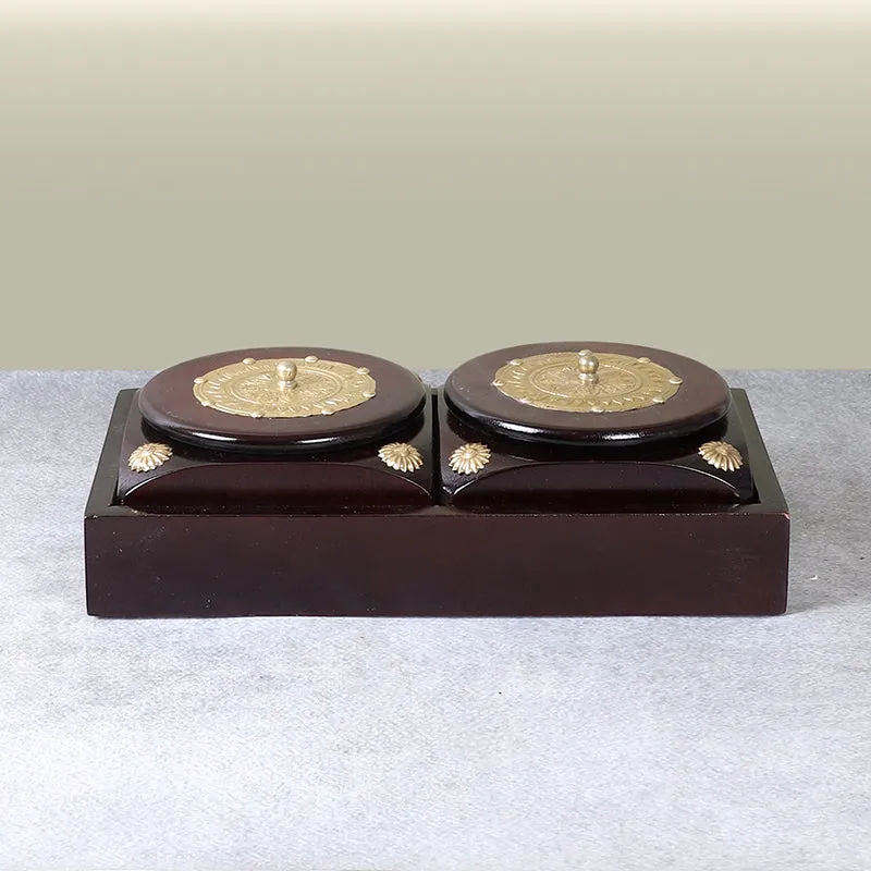 Front view of a brown dry fruit container with two decorative round lids