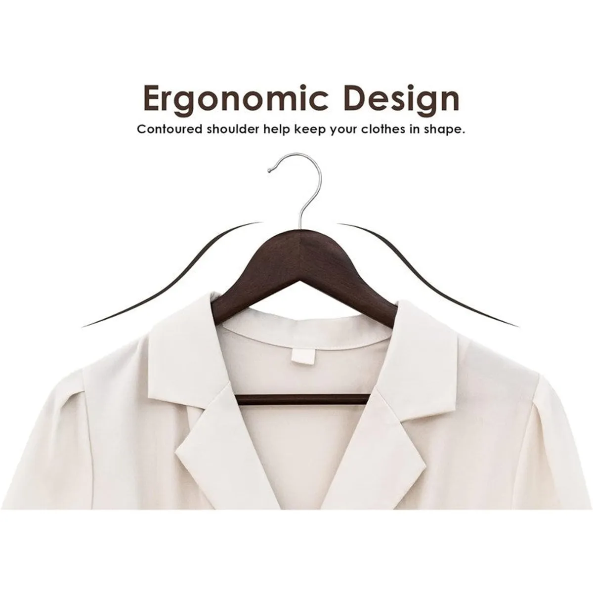 Brown contoured wooden hanger holding a white shirt