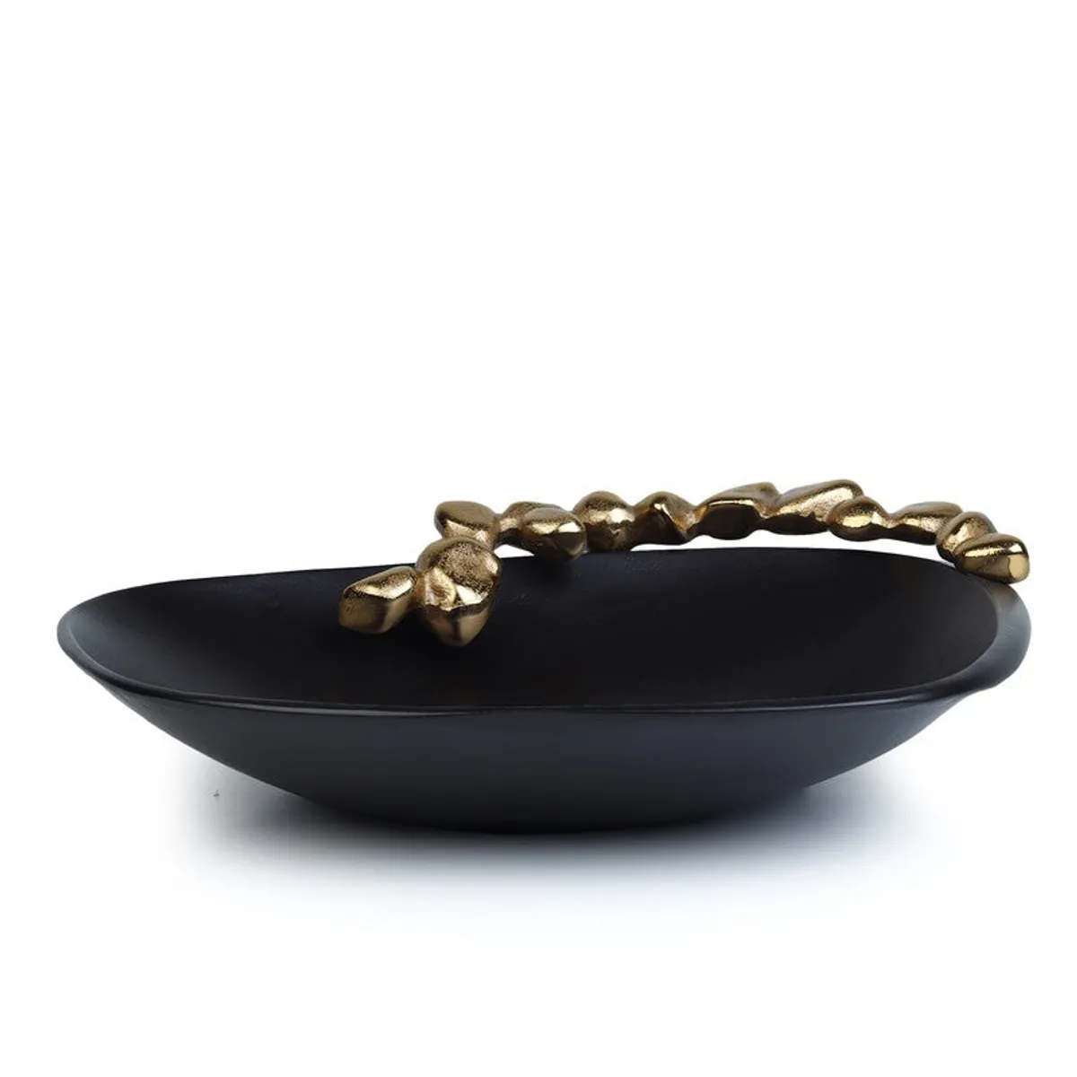 Side view showing the shallow black bowl and raised gold decorative rim.