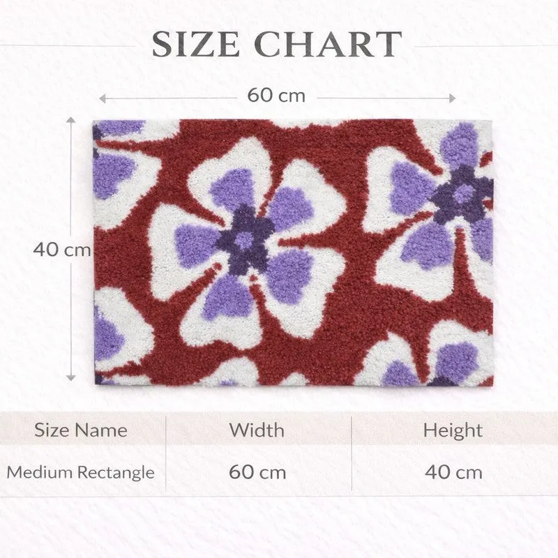 Floral bath mat shown with size chart graphic