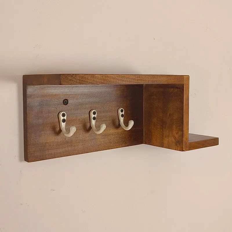 Brown wooden wall organiser showing three key hooks and an open side shelf.