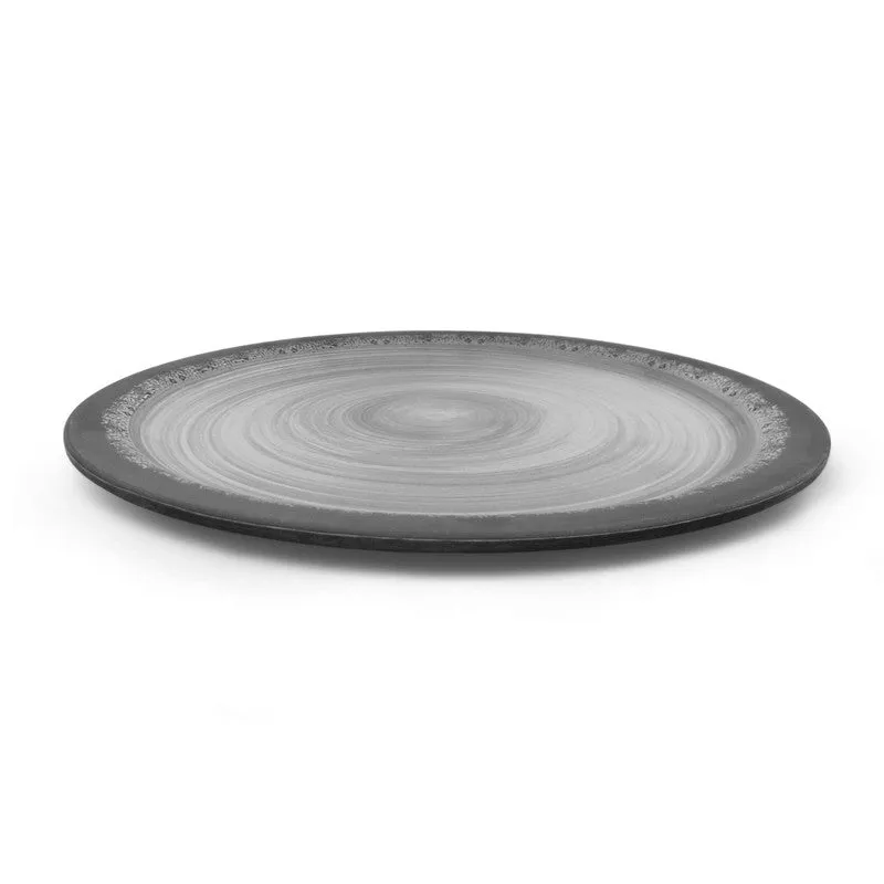 Side view showing the slim profile of a black and grey dinner plate
