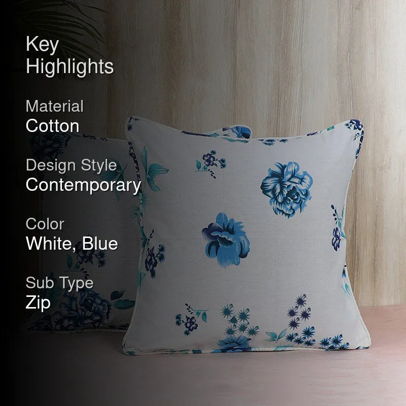Blue and white floral cushion covers styled on a sofa