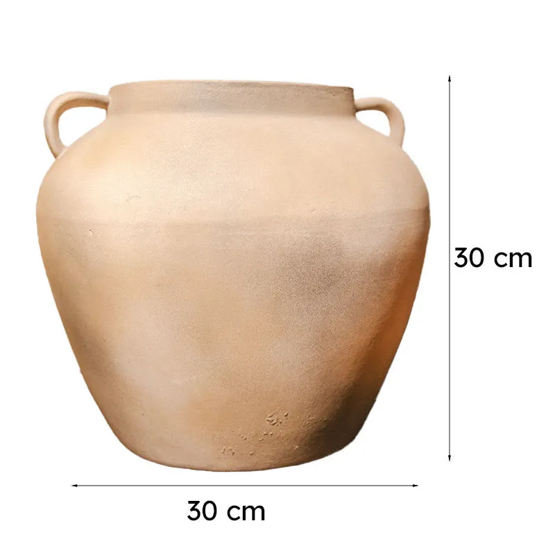 Beige ceramic vase on a white background