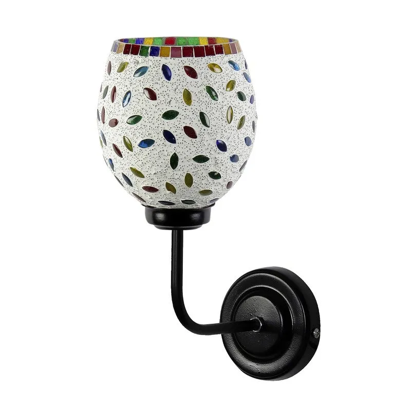 Front angled view of white mosaic glass wall lamp with black iron base