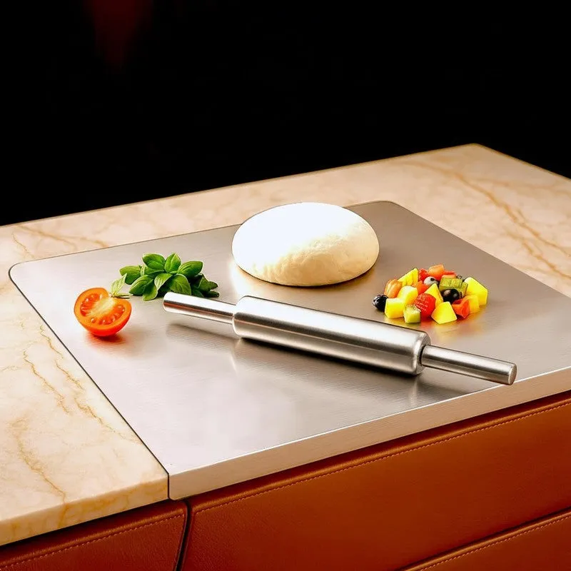 Silver rolling pin and steel board set displayed on a countertop