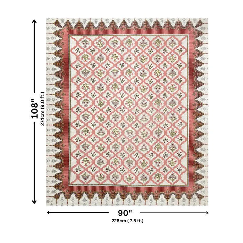 Full view of the peach patterned bedsheet laid flat