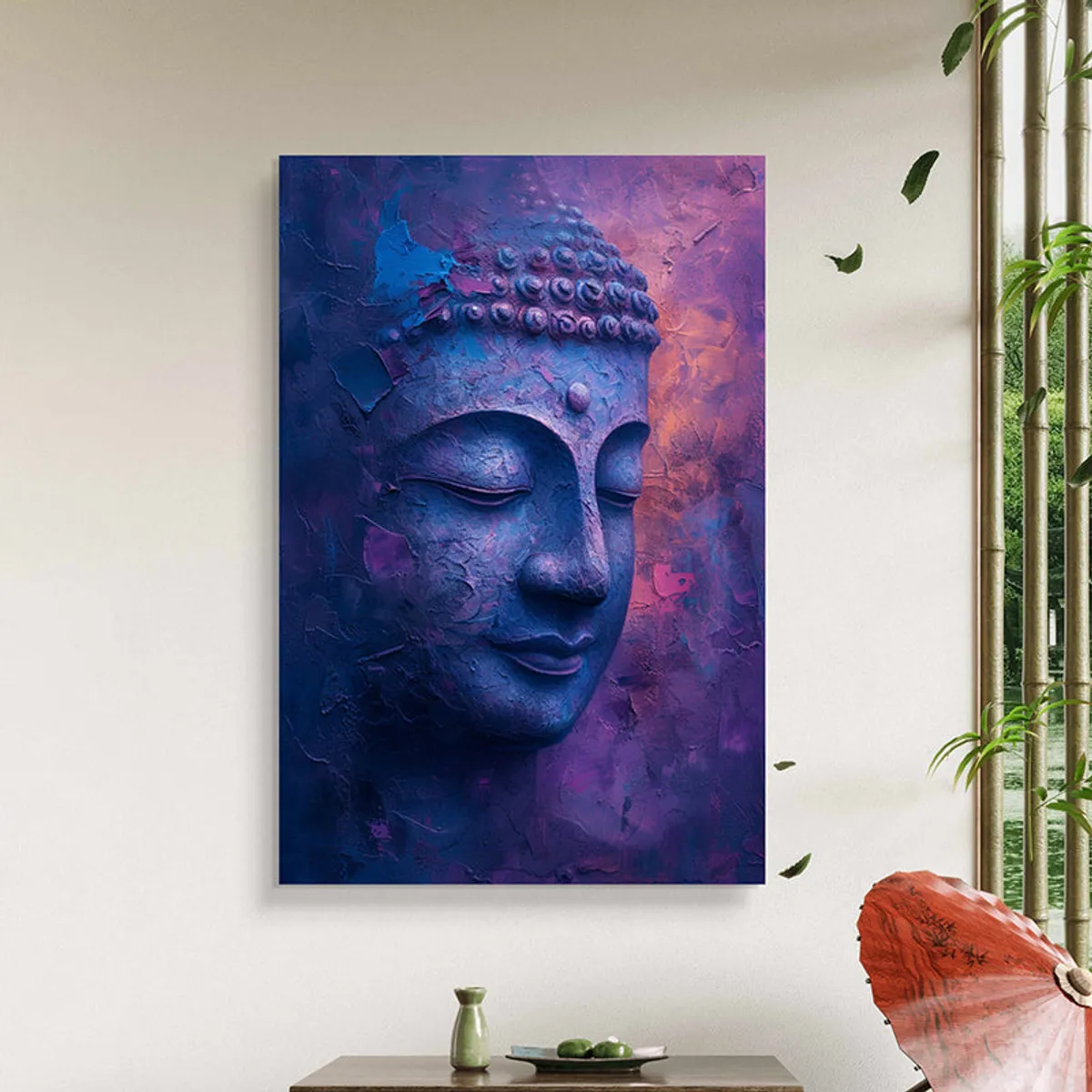 Buddha canvas wall art styled on a light wall with bamboo decor