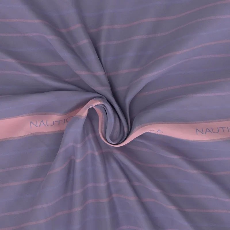 Close-up of purple cotton bedsheet fabric with pink stripes