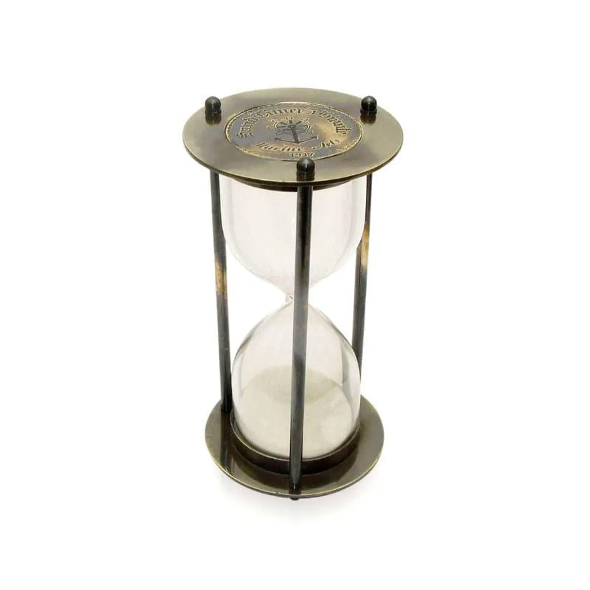 Angled view of a transparent hourglass with metal frame and engraved top