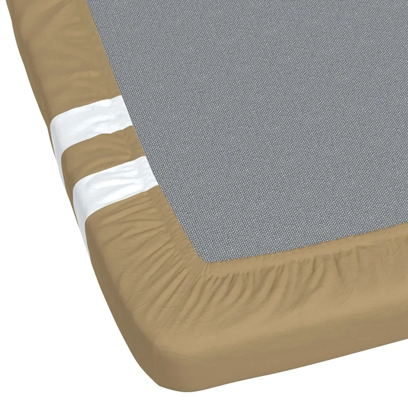 Corner view of fitted tan bedsheet with white stripes and elastic edge