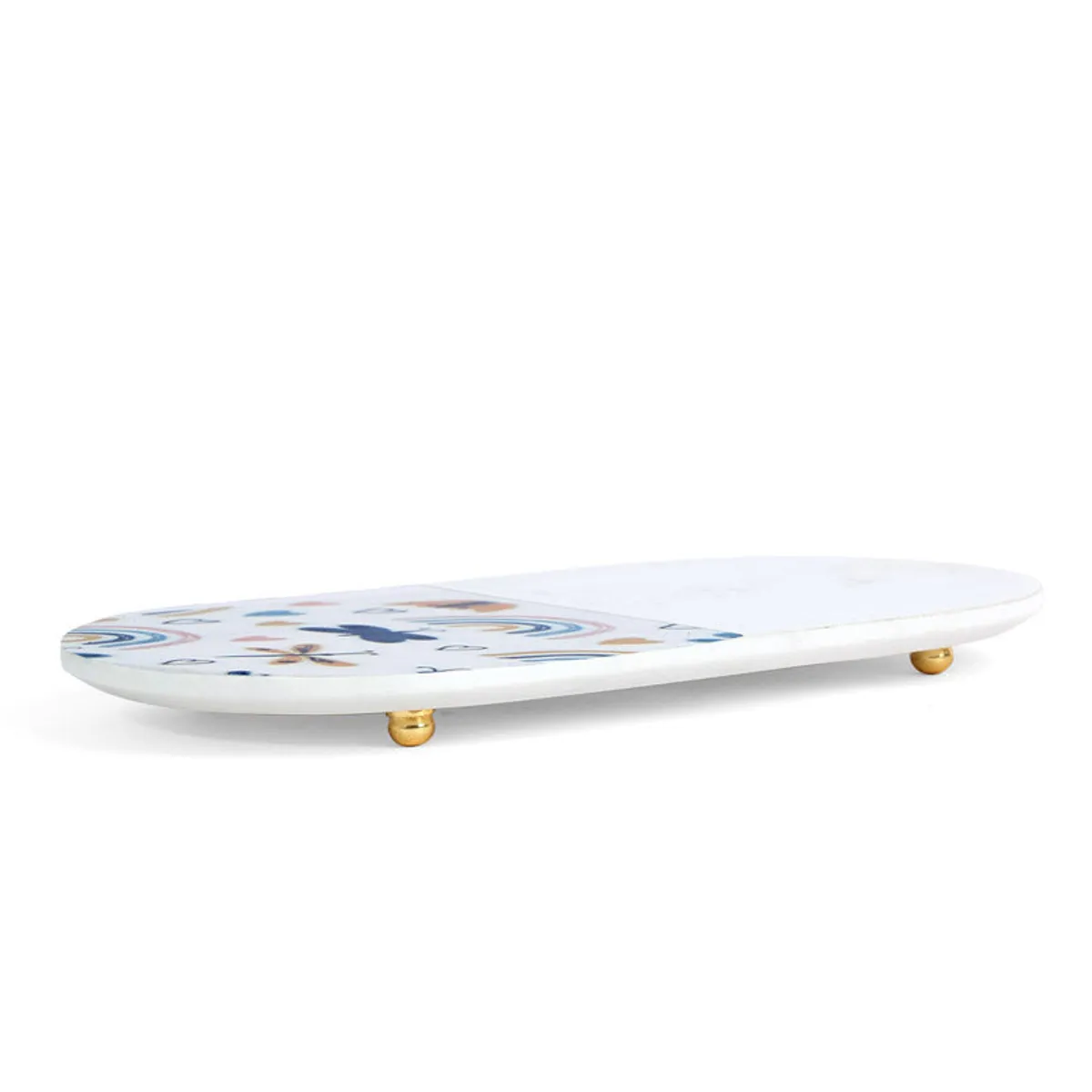 White oval platter shown in profile with colourful print and gold-toned feet