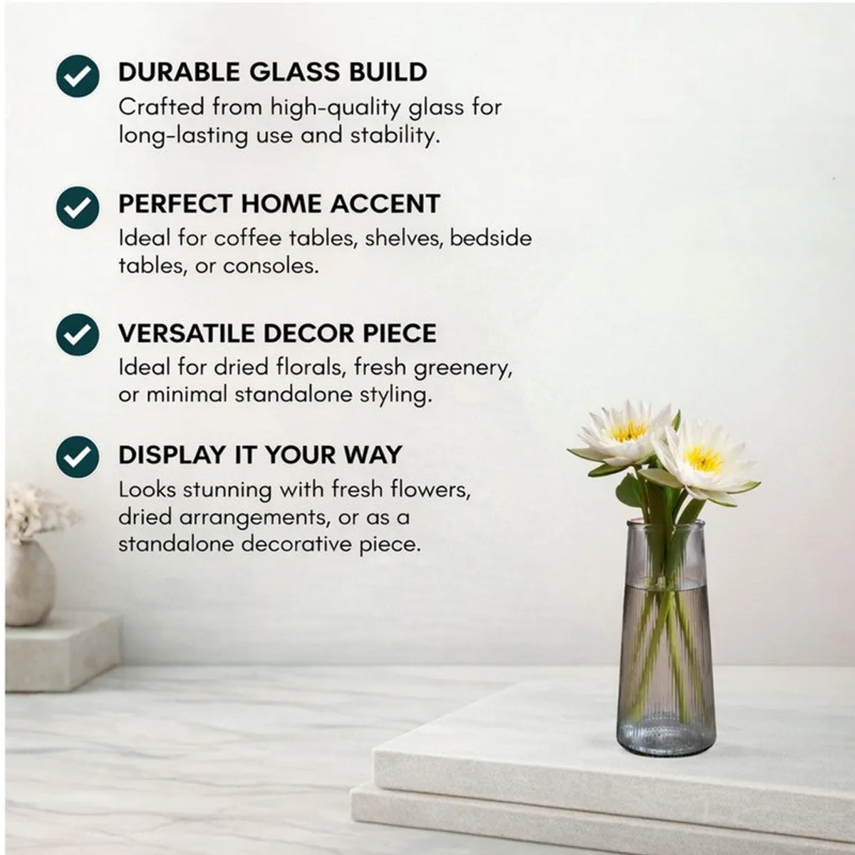 Grey fluted vase with white flowers beside feature text layout