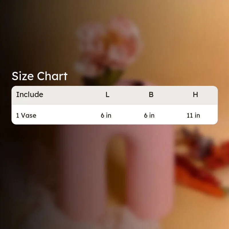 Size chart graphic shown over a blurred pink vase background