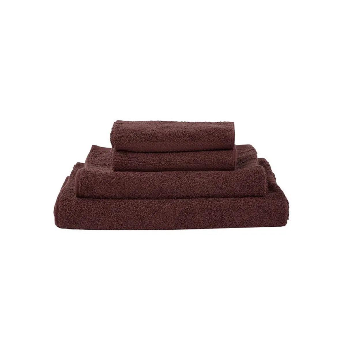 Four brown towels folded in a neat stack on a white background.
