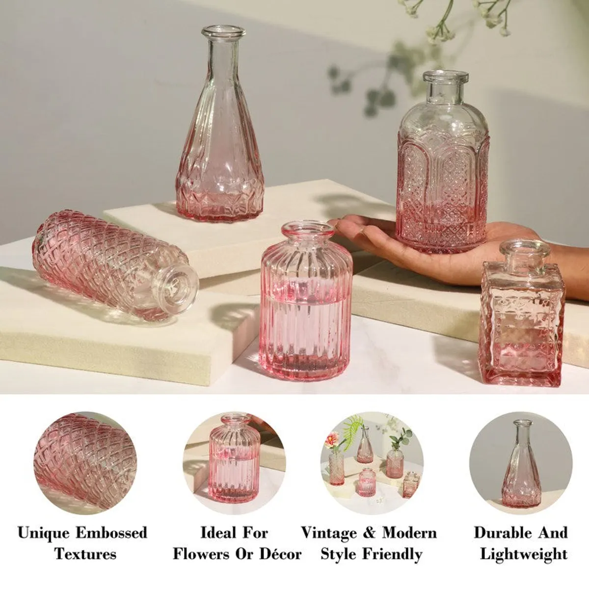 Pink glass vase set with close-up texture and assorted shapes