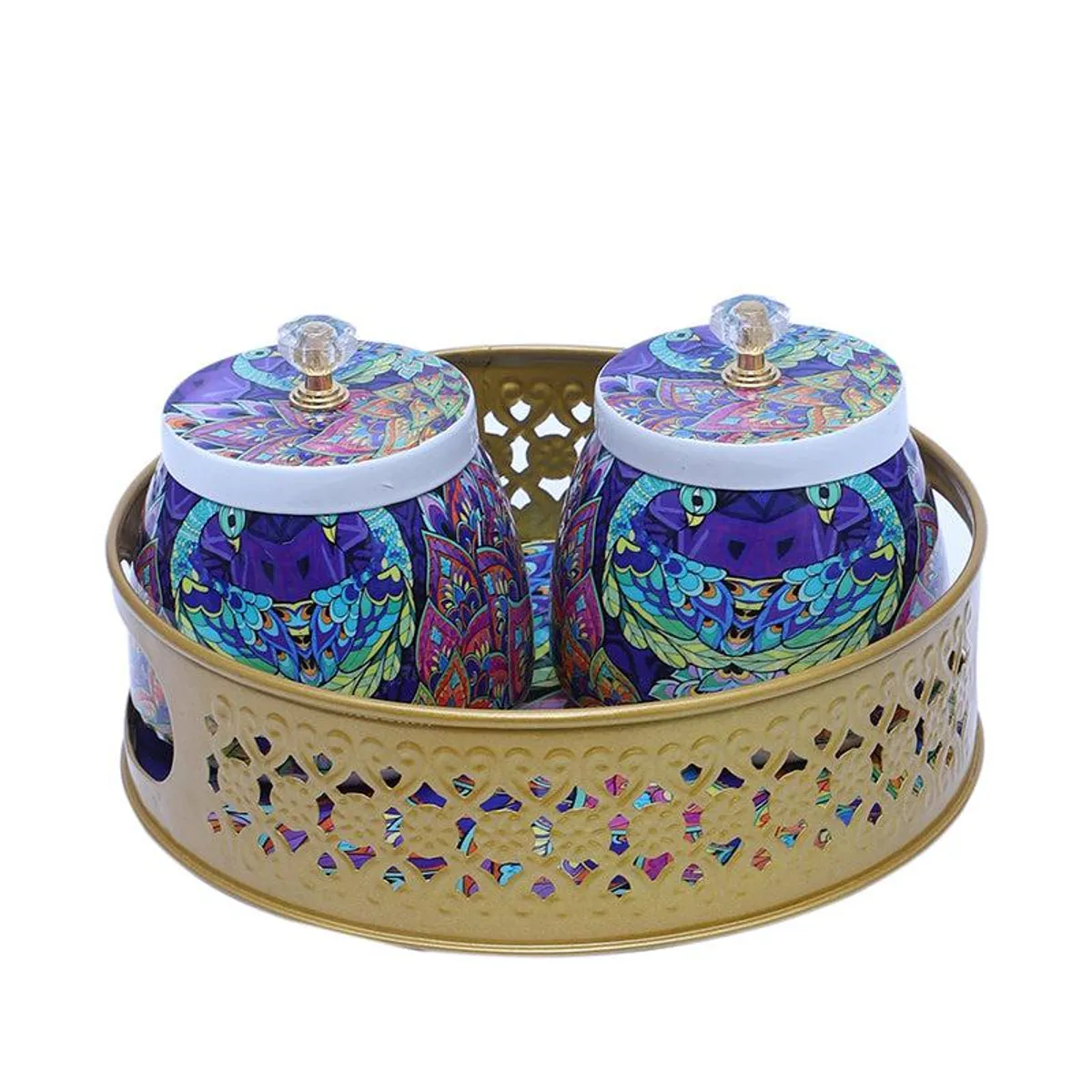 Two vibrant patterned jars placed inside a gold tray
