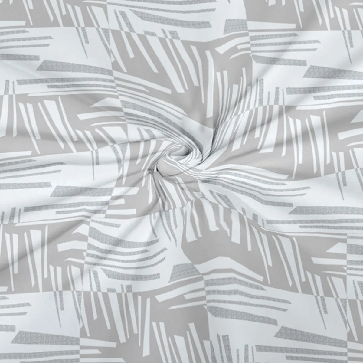 Close-up of the grey and white abstract printed bedsheet fabric