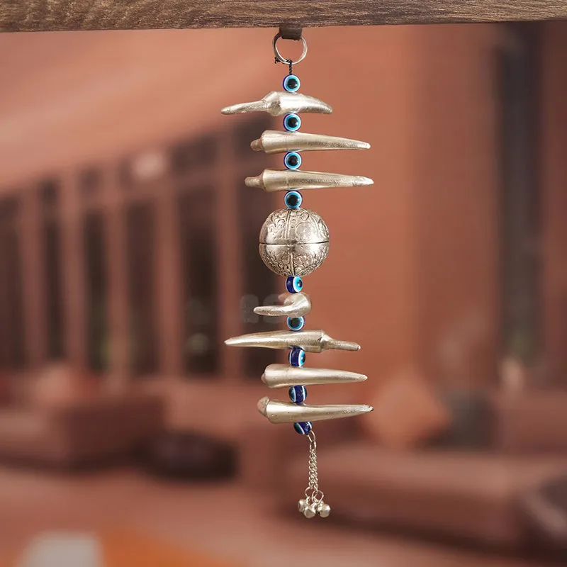 Single silver hanging latkan with engraved globe detail and blue bead accents