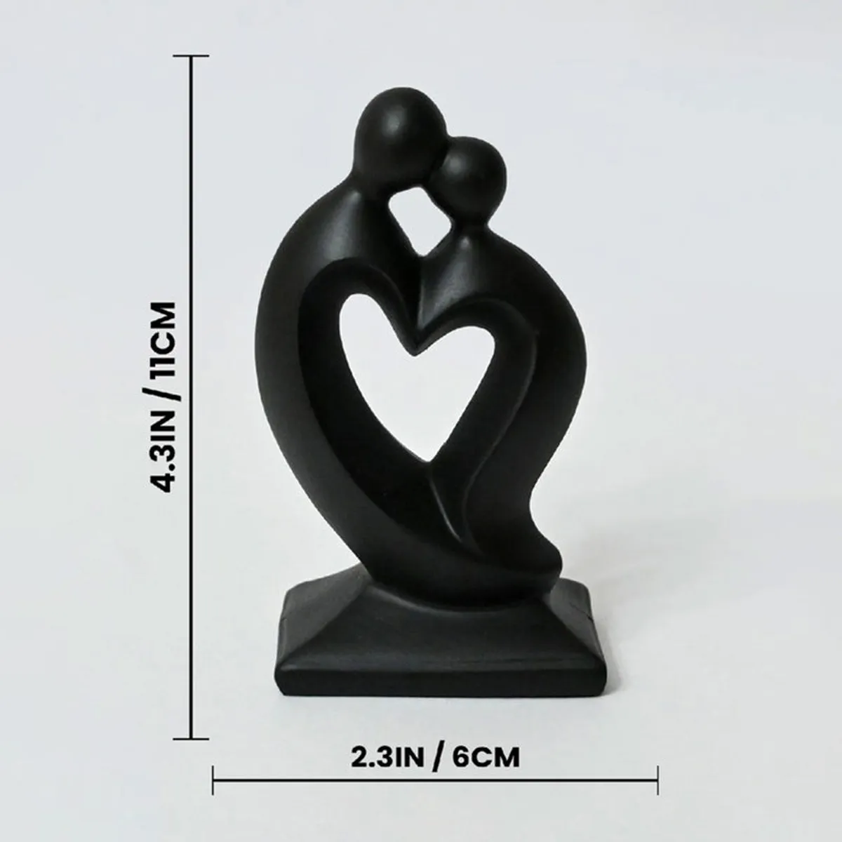 Black abstract couple showpiece on a white background