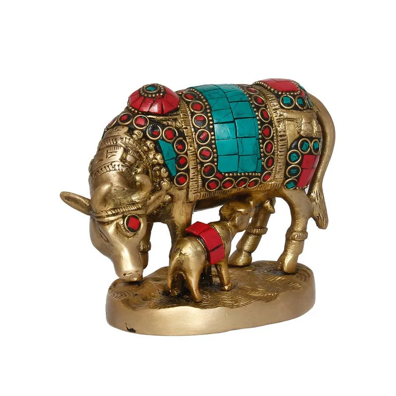 Angled view of ornate Gau Mata brass idol in brass finish