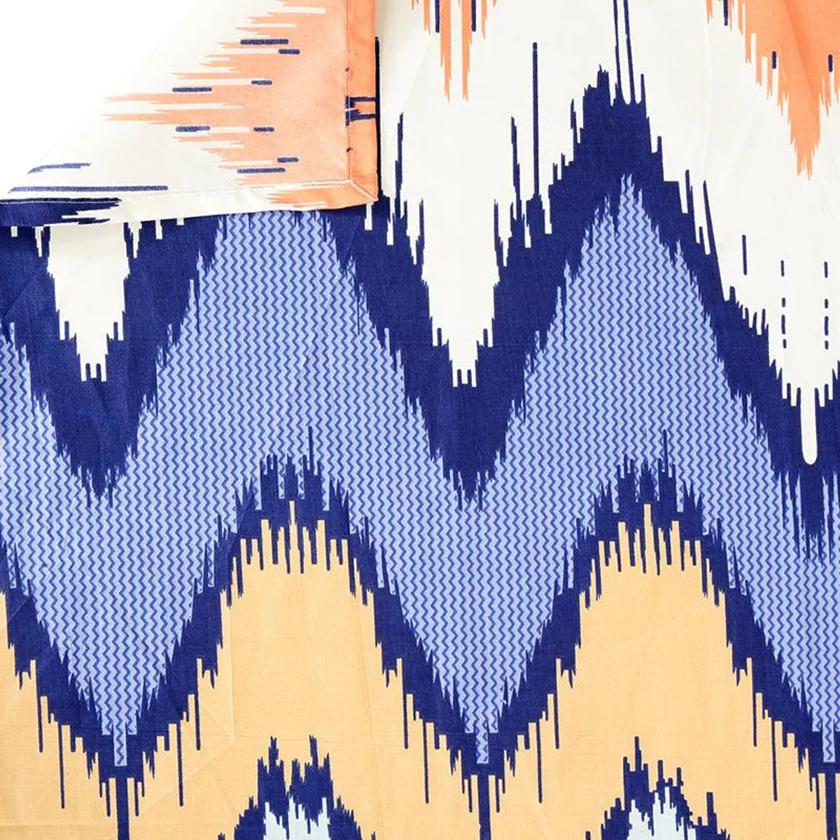 Close-up of the abstract zigzag pattern in blue, peach, white and beige