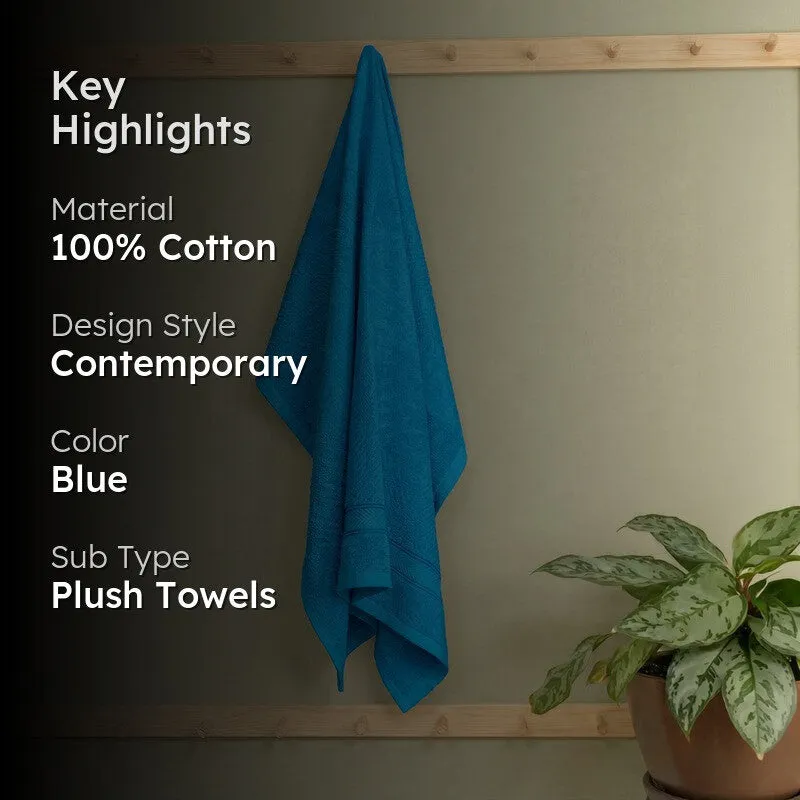 Vivid blue bath towel hanging with key highlights text overlay