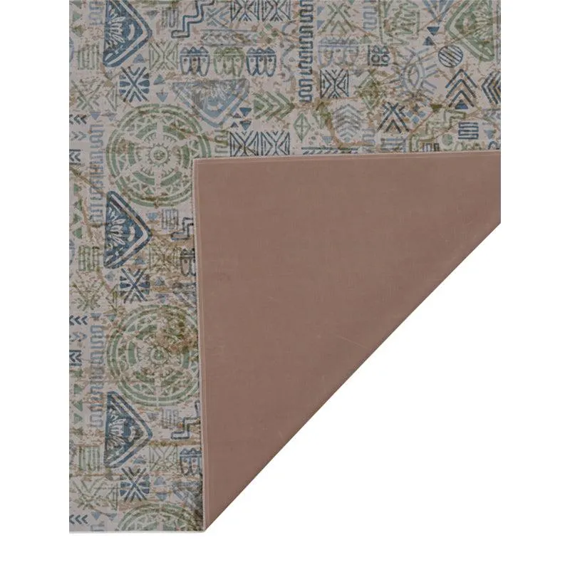 Back corner of the carpet with patterned front visible