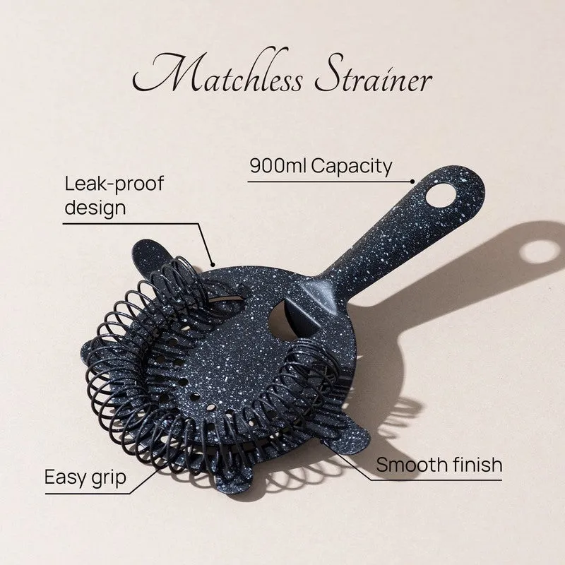 Close view of a black cocktail strainer with a round mesh bowl