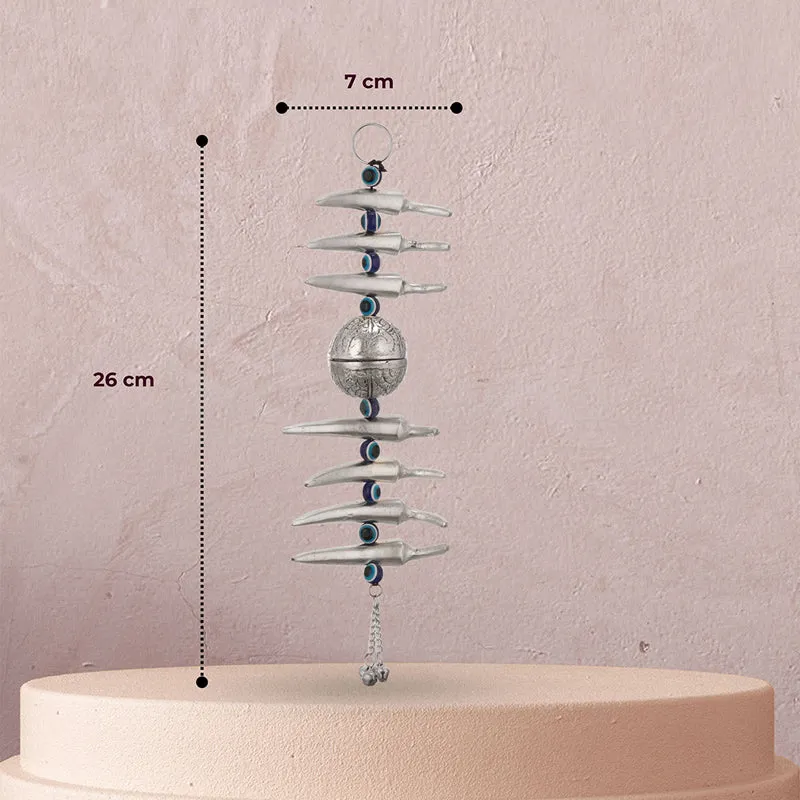 Single silver hanging latkan with size markers shown beside it