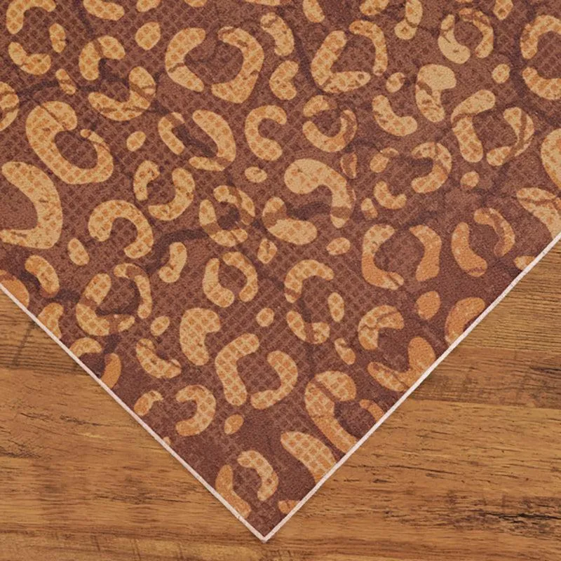 Angled corner view of the brown patterned rectangular carpet