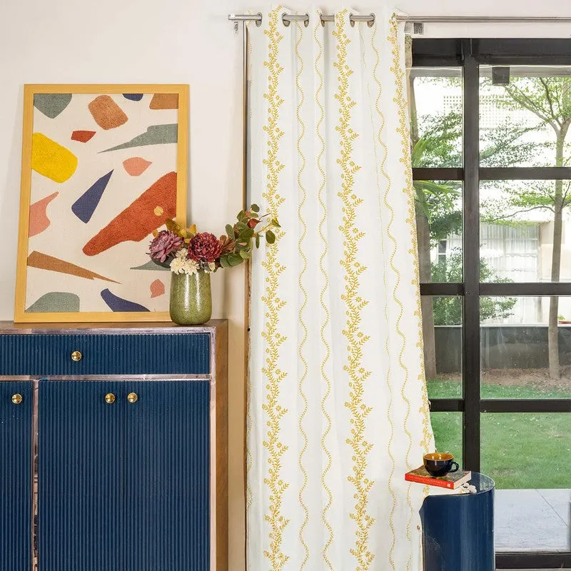 Styled room view of Urban Space Boho White and Yellow cotton room-darkening curtain panel