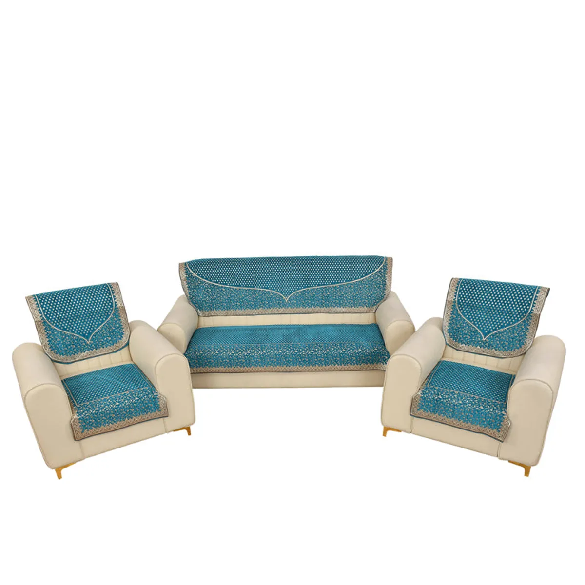 Aqua blue covers arranged across a sofa and two armchairs