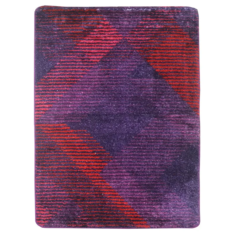 Full view of purple and red geometric rug with rounded corners