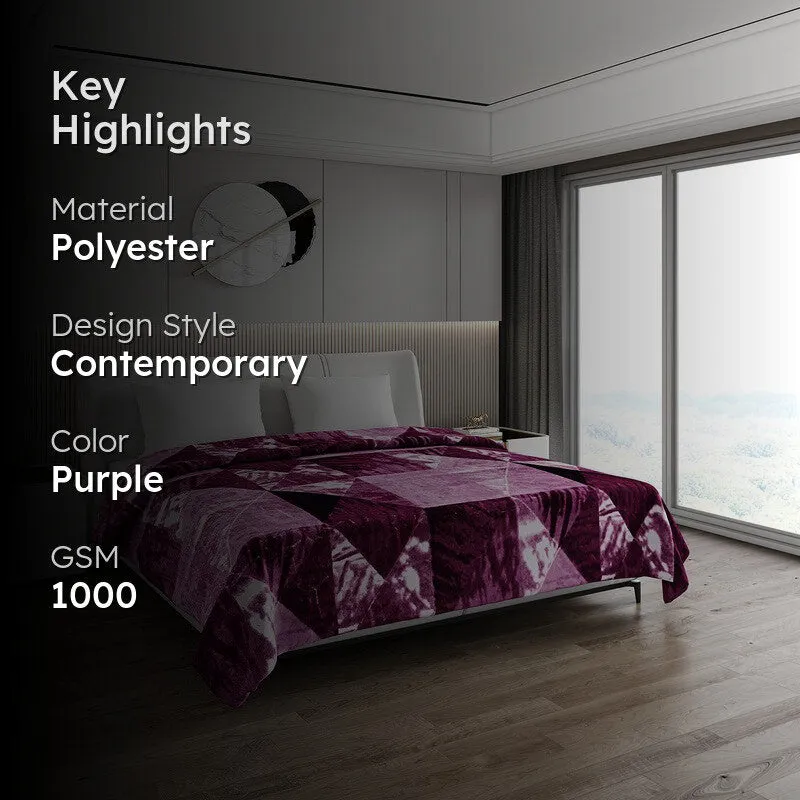 Purple blanket styled on a bed with material and design highlights