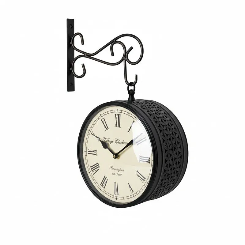 Black round wall clock with ornate hanging bracket shown against a white background.