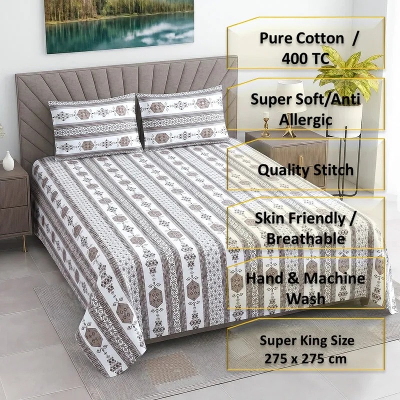 Styled bedroom scene with the patterned bedsheet spread neatly across the bed.