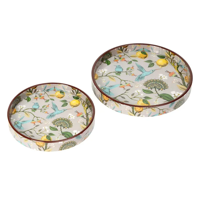 Large and small round trays displayed separately with colourful botanical artwork.