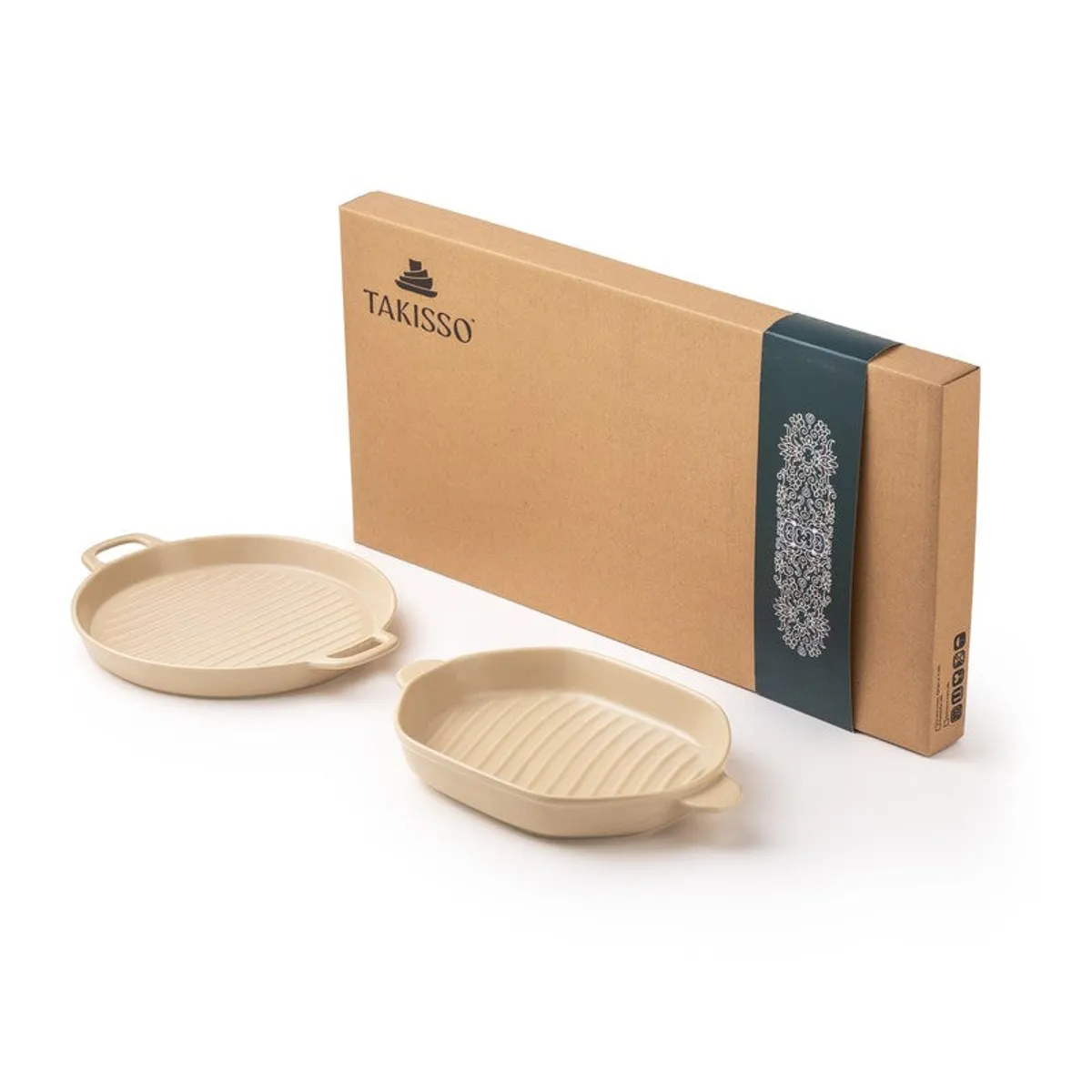 Two ivory platters displayed beside their packaging