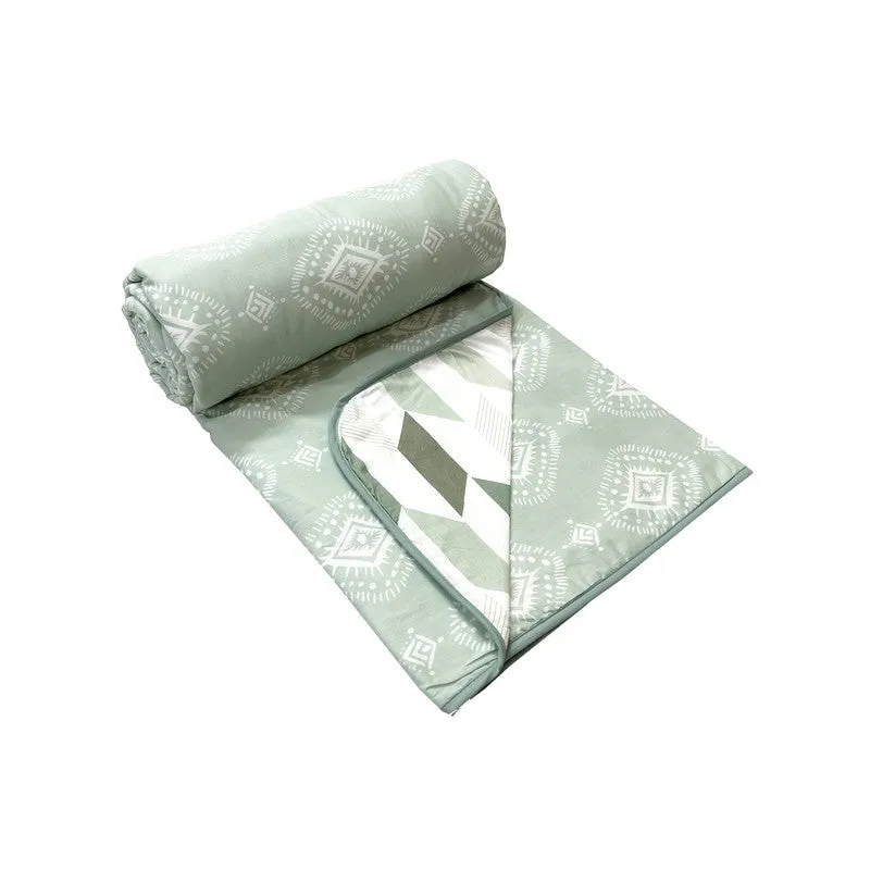Rolled olive green cotton dohar with both printed sides displayed