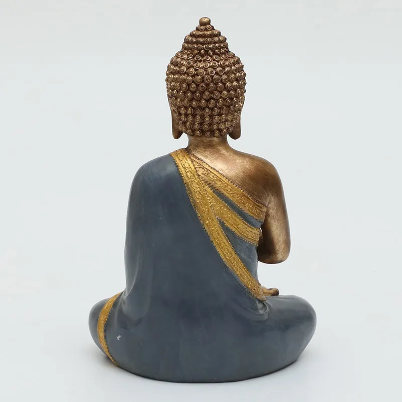 Rear view of the grey and gold Buddha idol