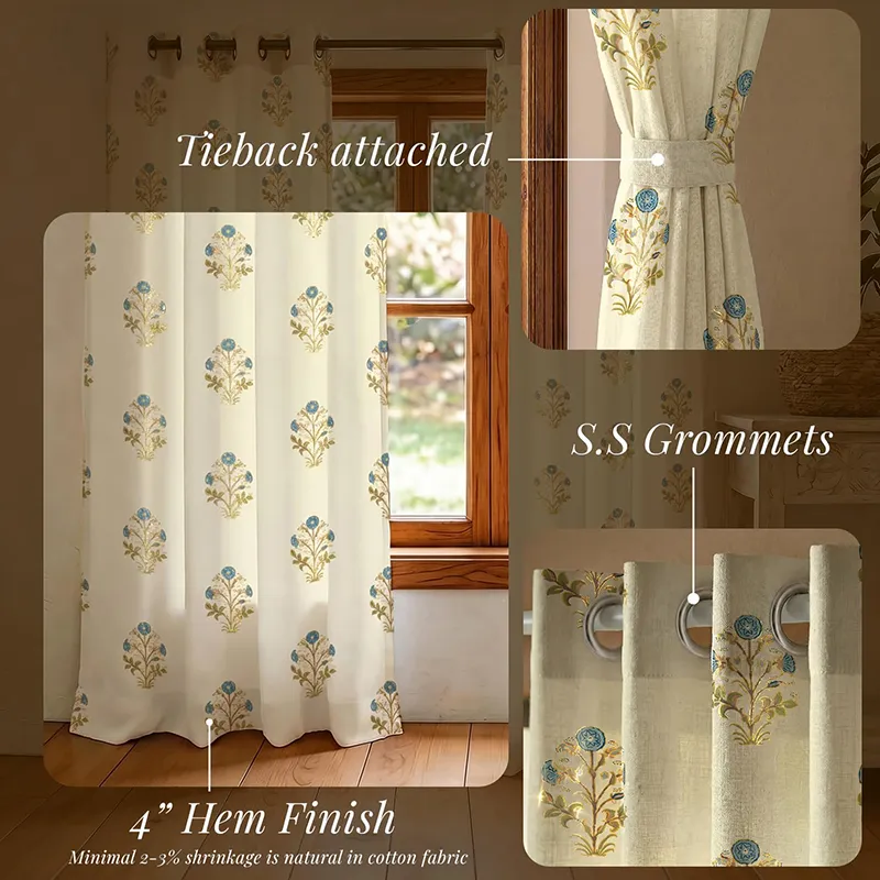 Floral printed curtain panel tied back beside a wooden window